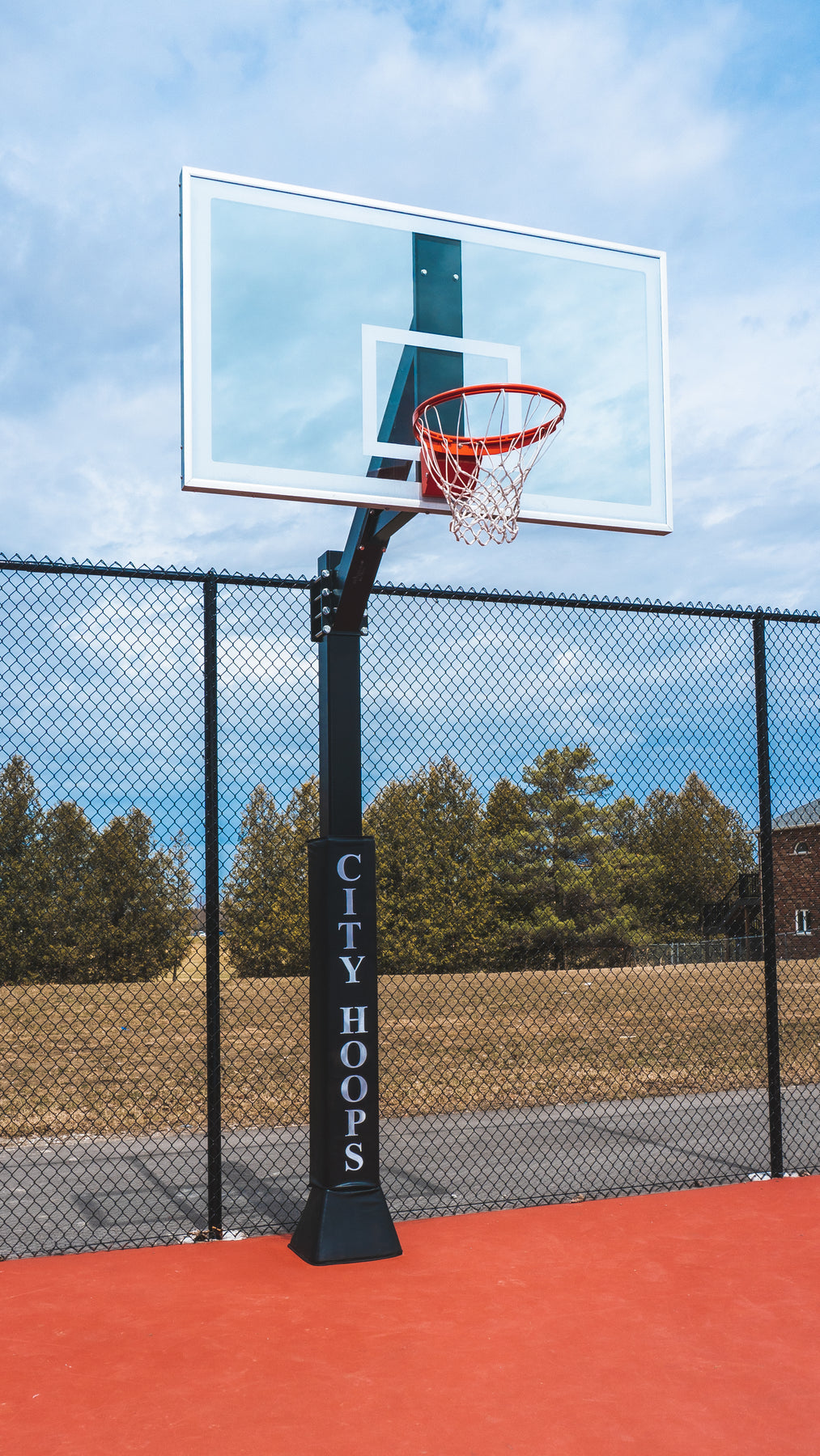 Fixed height inground basketball net system